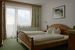 Doppelbett der Juior-Suite © Hotel Garni Glück auf